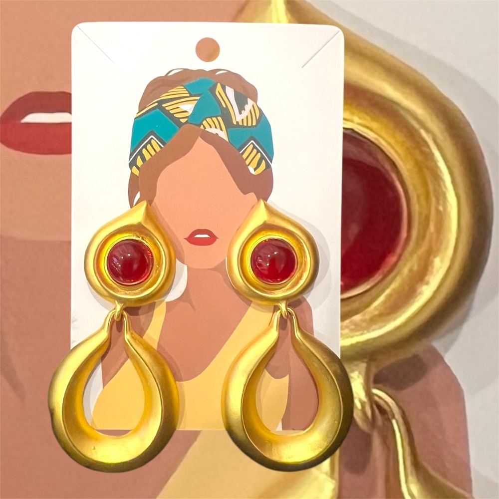 Gold Drop Statement Earrings with Red Accent